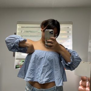 Zara blue and white striped blouse with ruffled sleeves.